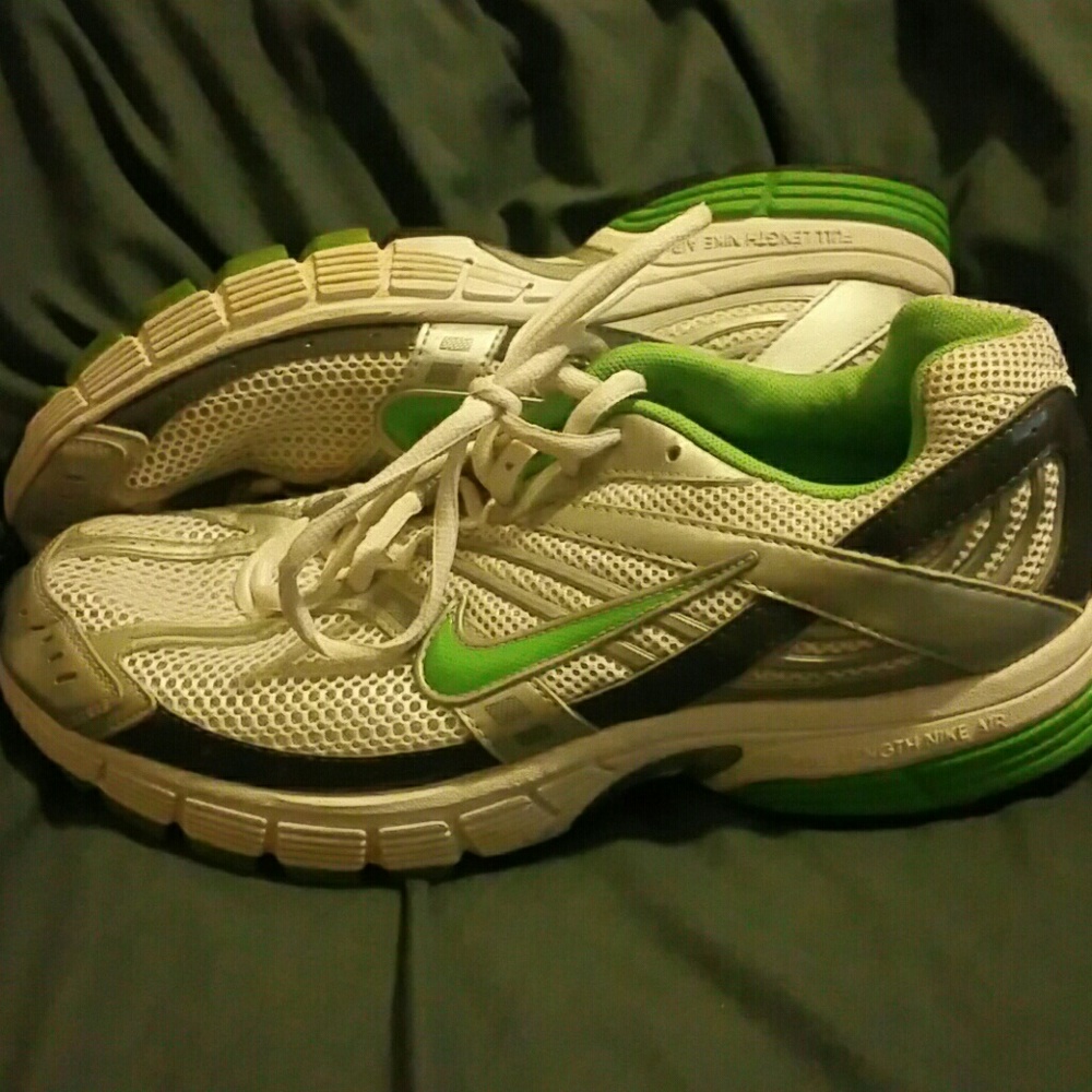 Green Nike running shoes